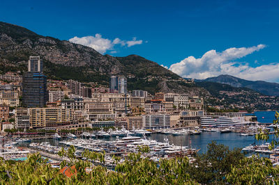 Scenic view of sea and buildings against sky