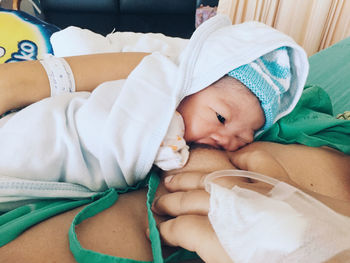 Cute baby sleeping in bed