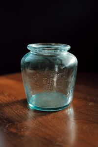 Close-up of glass of jar on table