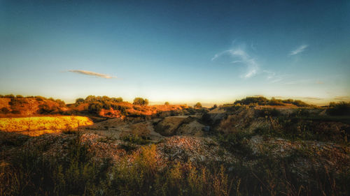 Scenic view of land against sky