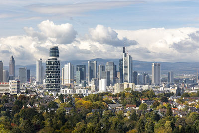 Modern buildings in city against sky