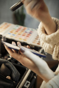 Close-up of woman using mobile phone