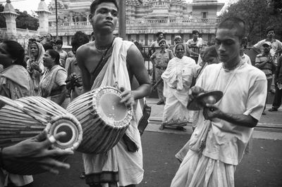 Group of people on street in city