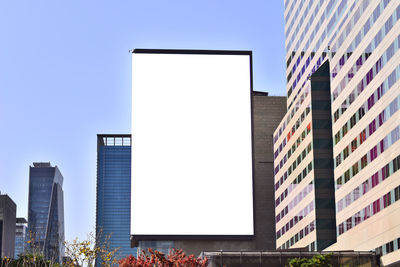 Modern buildings against clear sky