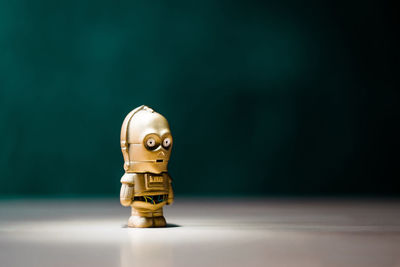 Close up of figurine on table