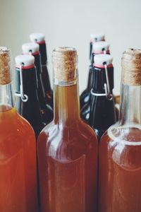 Close-up of wine bottles on table