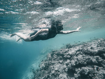 Man swimming in sea