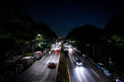 Cars moving on road at night