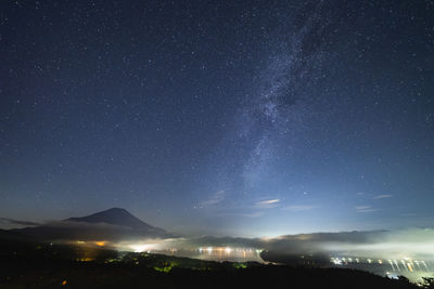 Scenic view of star field against sky at night