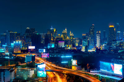 High angle view of illuminated cityscape at night