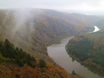 High angle view of lake against sky during autumn