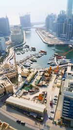 High angle view of street amidst buildings in city