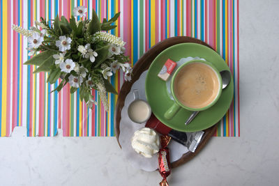 Multi colored coffee on table