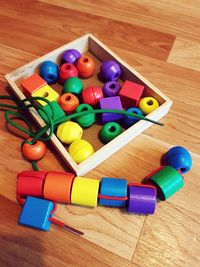 High angle view of multi colored balls on table