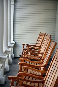 Empty chairs and tables in building