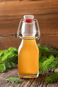 Close-up of beer glass bottle on table