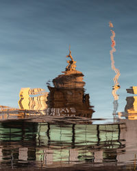 Reflection of the city of glasgow in the river clyde