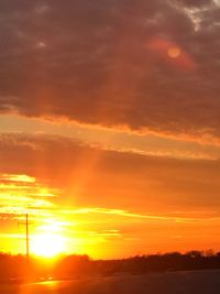 Scenic view of dramatic sky during sunset