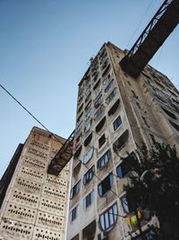 Low angle view of building against blue sky