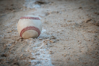 Close-up of ball on sand