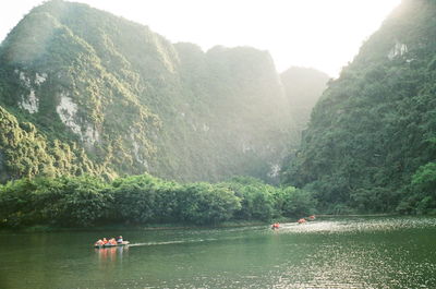 Scenic view of river and mountains