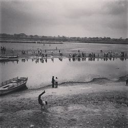 Reflection of people in water