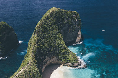 High angle view of rock in sea