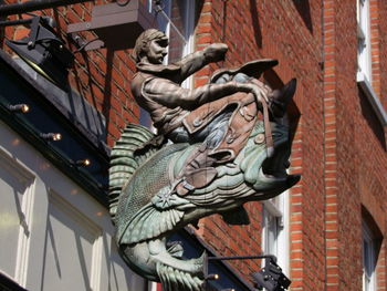 Low angle view of statue of building