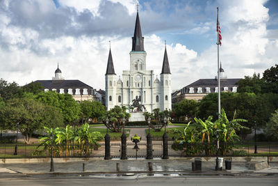 View of temple building against cloudy sky