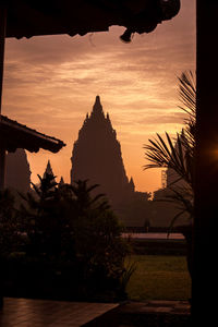 Silhouette of temple at sunset