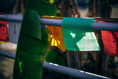Close-up of flags against blurred background