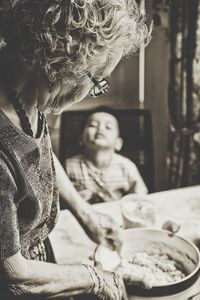 Grandmother preparing cake