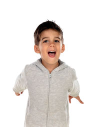 Portrait of boy standing against white background