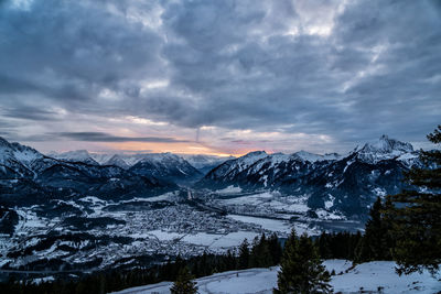 Scenic view of snowcapped mountains against sky