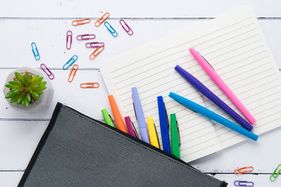 High angle view of colored pencils on table
