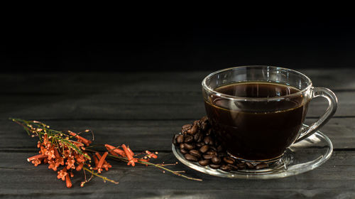 Close-up of coffee cup on table