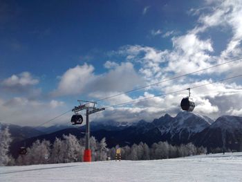 Scenic view of mountains against sky during winter