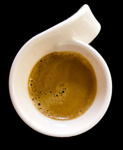 Close-up of coffee on black background