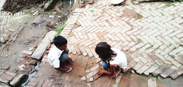 High angle view of people on footpath