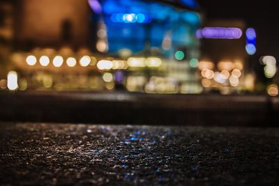 Defocused image of illuminated city at night