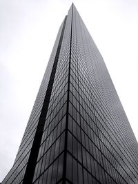 Low angle view of skyscraper against clear sky