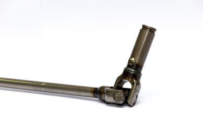 High angle view of coin-operated binoculars against white background