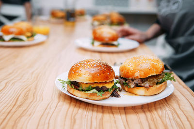 Burgers with beef and vegetables. close up. delicious burgers in a cooking class. 