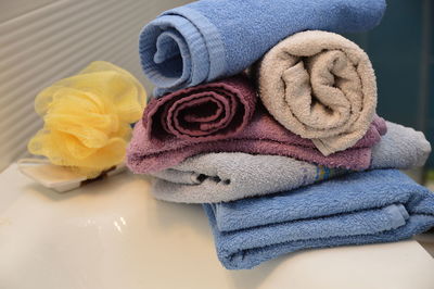 Close-up of linens on sink in bathroom