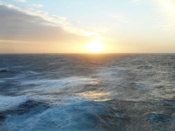 Scenic view of sea at sunset