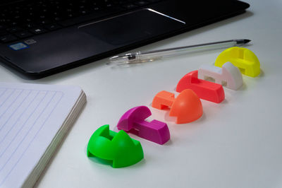 High angle view of multi colored pencils on table