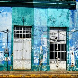 Closed door of abandoned house