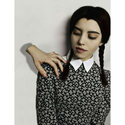 Close-up of young woman against white background