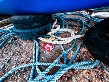 High angle view of rope tied on metal
