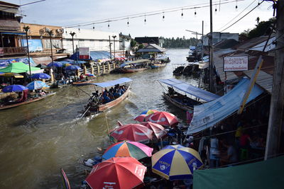 High angle view of people on boats in canal